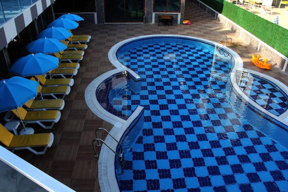 Merlin Beach Park Hotel Tosmur ภายนอก รูปภาพ
